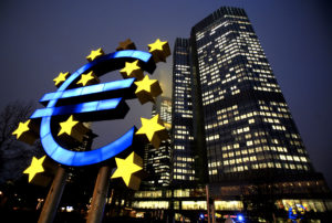 A Euro sign sculpture is seen in front of the European Central Bank (ECB) headquarters in Frankfurt, Germany, on Wednesday, Feb. 3, 2010. European Central Bank President Jean-Claude Trichet said he's confident Greece can get its budget deficit under control and signaled officials have no plans to raise their key interest rate from a record low of 1 percent. Photographer: Hannelore Foerster/Bloomberg